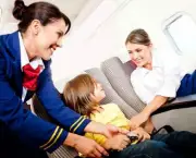 Air hostess helping a kid